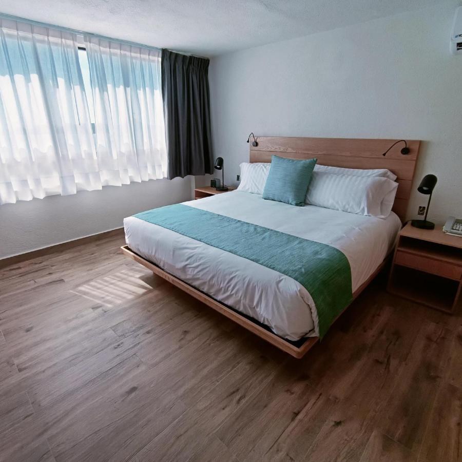 SUNROCK HOTEL & SUITES