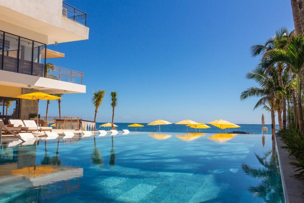 THE FIVES OCEANFRONT - PUERTO MORELOS photo 1